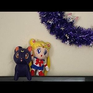 Sailor Moon display! Sailor Moon & Luna plushies! Plus Artemis in a moon wreath!